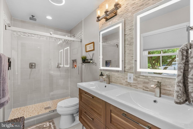 2302 Solmar Dr, Silver Spring, MD 20904 - bathroom with a shower stall, toilet, double vanity, and tasteful backsplash