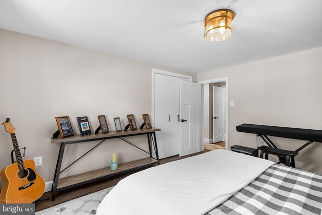 2302 Solmar Dr, Silver Spring, MD 20904 - bedroom featuring baseboards and wood finished floors