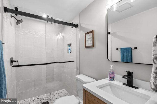 2302 Solmar Dr, Silver Spring, MD 20904 - bathroom featuring vanity, a stall shower, and toilet