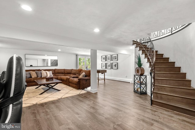 2302 Solmar Dr, Silver Spring, MD 20904 - living room with stairs, wood finished floors, recessed lighting, and baseboards