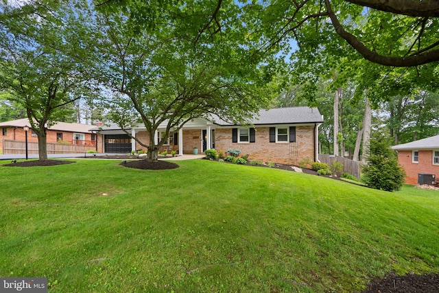 2302 Solmar Dr, Silver Spring, MD 20904 - ranch-style home with an attached garage, brick siding, central AC, and driveway