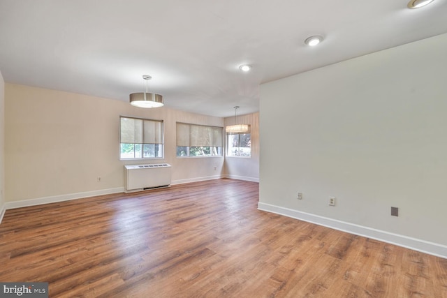 3601 5th St S Unit 211, Arlington, VA 22204 - unfurnished room featuring baseboards and wood finished floors