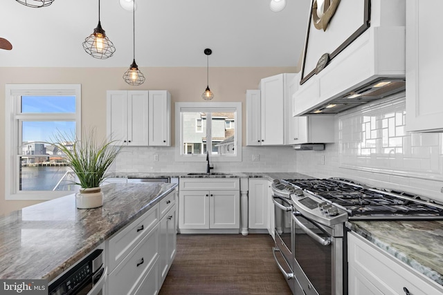 1169 Jennifer Ln, Manahawkin, NJ 08050 - kitchen featuring stainless steel range with gas cooktop, a sink, backsplash, white cabinets, and stone counters
