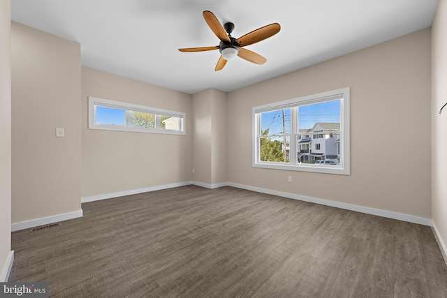 1169 Jennifer Ln, Manahawkin, NJ 08050 - spare room with baseboards, ceiling fan, and wood finished floors