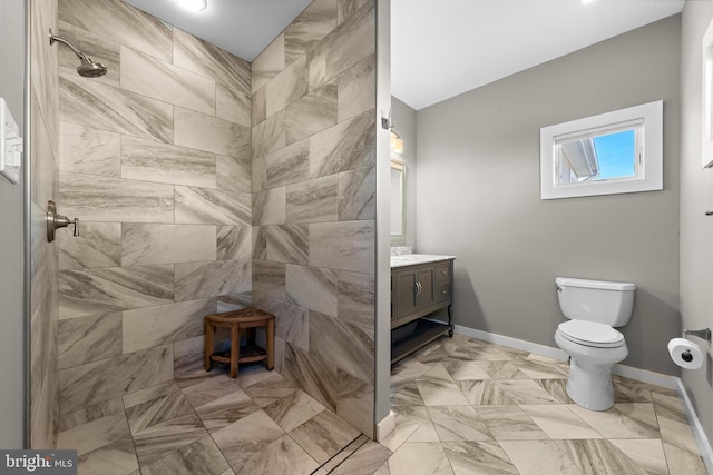1169 Jennifer Ln, Manahawkin, NJ 08050 - full bathroom featuring vanity, tiled shower, toilet, and baseboards