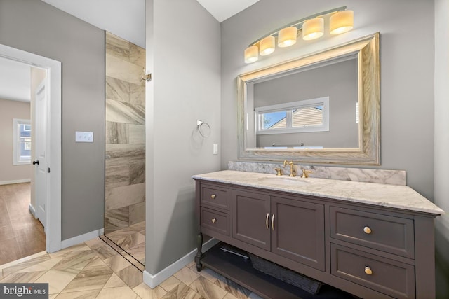 1169 Jennifer Ln, Manahawkin, NJ 08050 - bathroom featuring vanity, plenty of natural light, a walk in shower, and marble finish flooring