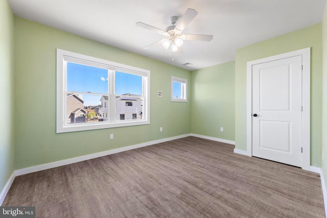 1169 Jennifer Ln, Manahawkin, NJ 08050 - empty room with ceiling fan, wood finished floors, and baseboards