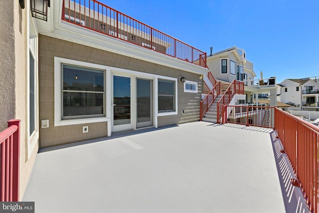 1169 Jennifer Ln, Manahawkin, NJ 08050 - view of patio with a residential view and stairway