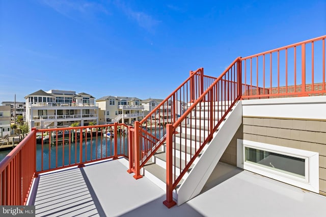 1169 Jennifer Ln, Manahawkin, NJ 08050 - balcony with stairway, a water view, and a residential view