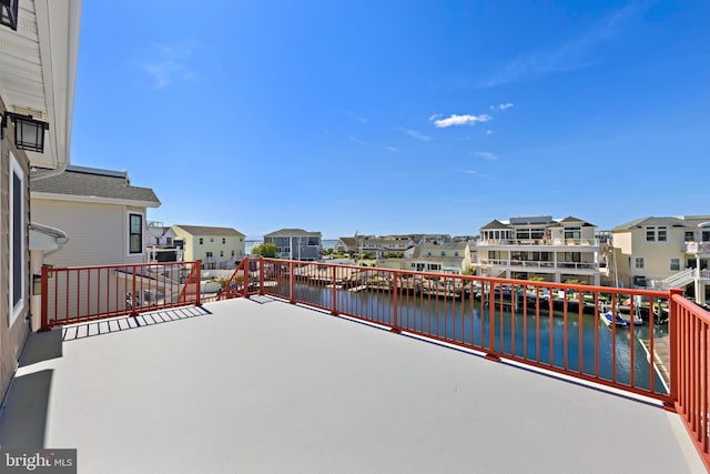 1169 Jennifer Ln, Manahawkin, NJ 08050 - view of patio / terrace with a residential view and a water view