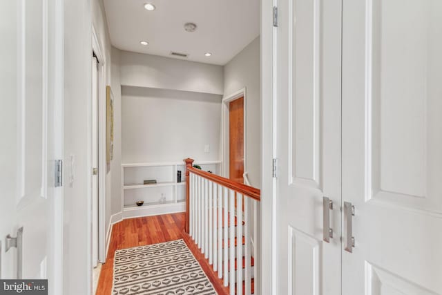 2031 Pine St Unit 4, Philadelphia, PA 19103 - corridor featuring light wood finished floors, recessed lighting, and an upstairs landing