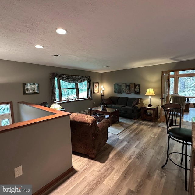 8201 Michaux Dr, Fayetteville, PA 17222 - living room with light wood finished floors, recessed lighting, and a textured ceiling