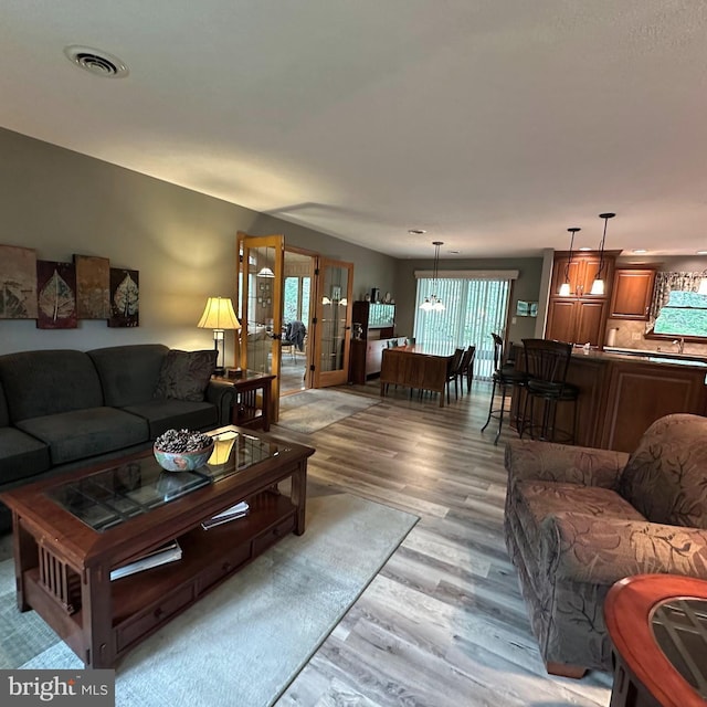 8201 Michaux Dr, Fayetteville, PA 17222 - living room with light wood-type flooring and french doors
