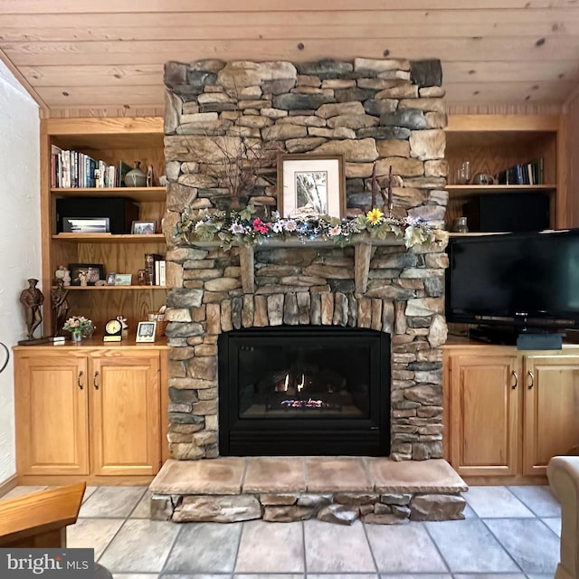 8201 Michaux Dr, Fayetteville, PA 17222 - living area featuring wooden ceiling, built in features, and a stone fireplace