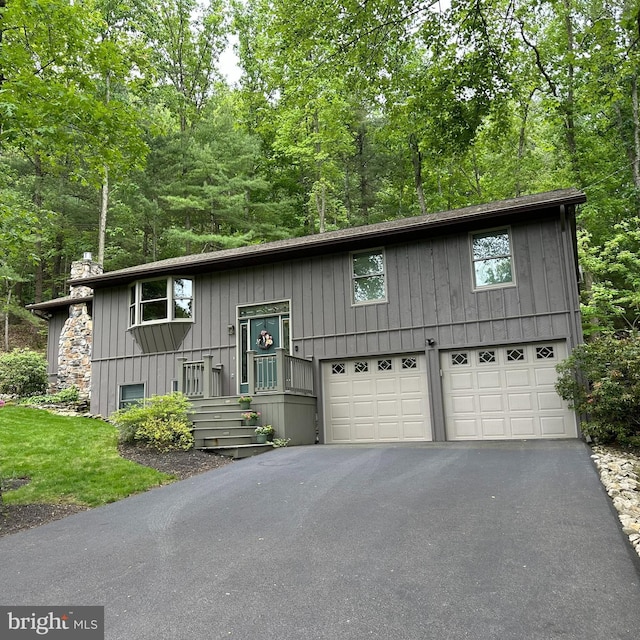 8201 Michaux Dr, Fayetteville, PA 17222 - bi-level home featuring a chimney and driveway