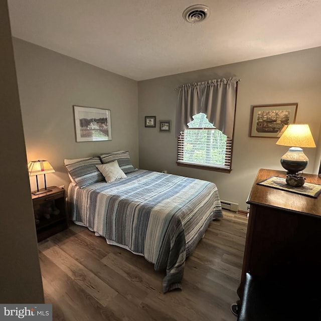 8201 Michaux Dr, Fayetteville, PA 17222 - bedroom featuring dark wood-style floors and a baseboard radiator