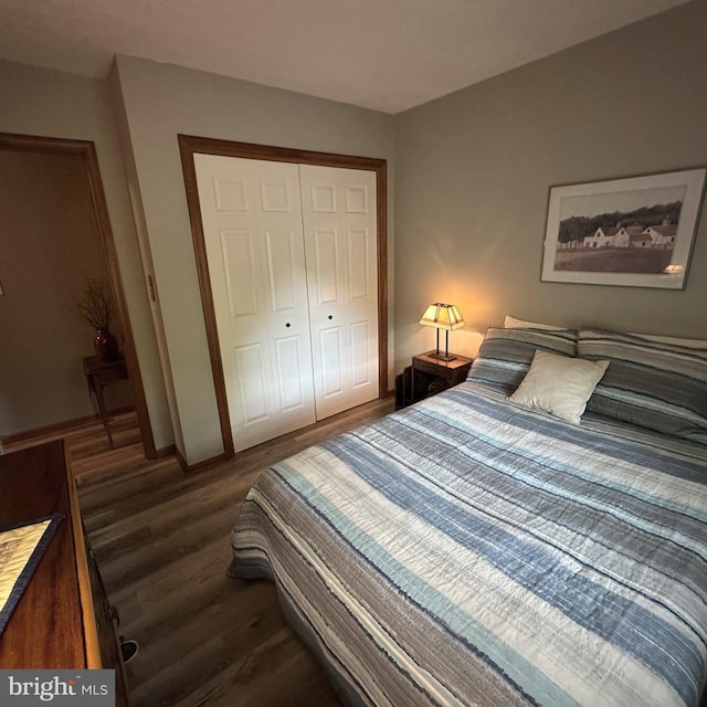 8201 Michaux Dr, Fayetteville, PA 17222 - bedroom with dark wood-style flooring, a closet, and baseboards