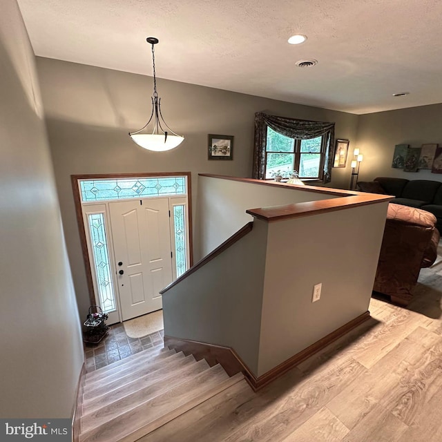 8201 Michaux Dr, Fayetteville, PA 17222 - foyer featuring light wood-type flooring, a textured ceiling, and recessed lighting