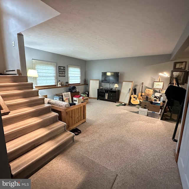 8201 Michaux Dr, Fayetteville, PA 17222 - living area with carpet floors, stairway, and a textured ceiling