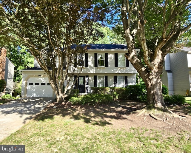 15082 Lindenberry Ln, Dumfries, VA 22025 - colonial house with an attached garage and driveway