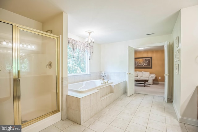 40801 Kiskadee Ln, Leonardtown, MD 20650 - full bath with tile patterned flooring, a chandelier, a garden tub, and a stall shower