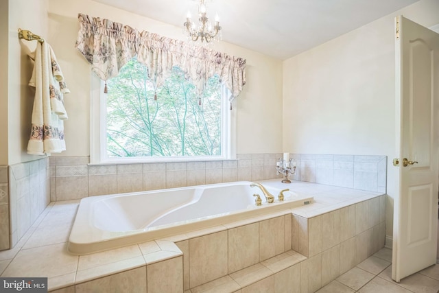 40801 Kiskadee Ln, Leonardtown, MD 20650 - bathroom featuring a chandelier, a garden tub, and tile patterned flooring