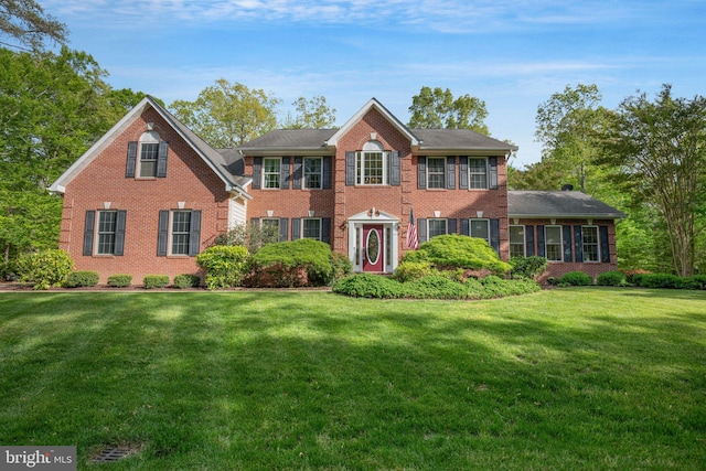 40801 Kiskadee Ln, Leonardtown, MD 20650 - view of front facade with brick siding and a front lawn