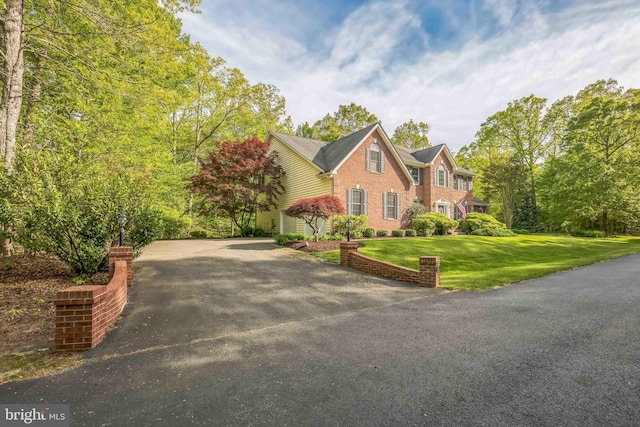 40801 Kiskadee Ln, Leonardtown, MD 20650 - view of front facade with brick siding and a front lawn