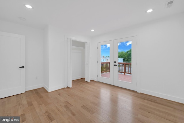 5318 5th St NW, Washington, DC 20011 - empty room featuring french doors, light wood-style floors, recessed lighting, and baseboards