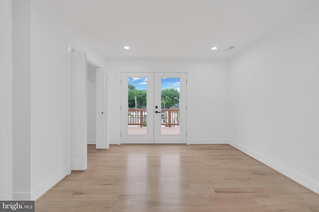 5318 5th St NW, Washington, DC 20011 - empty room with light wood-type flooring, baseboards, french doors, and recessed lighting