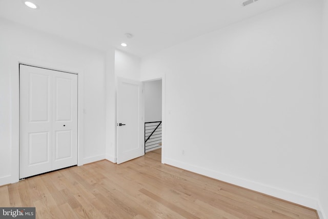 5318 5th St NW, Washington, DC 20011 - unfurnished bedroom with light wood finished floors, recessed lighting, baseboards, and a closet