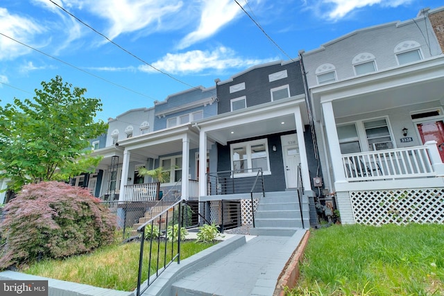 5318 5th St NW, Washington, DC 20011 - view of property featuring a porch and stairs