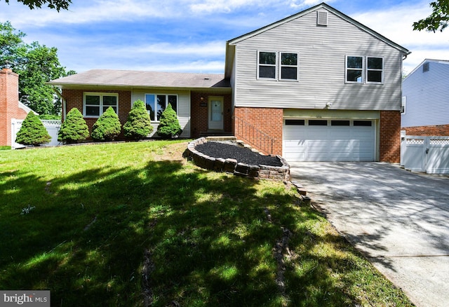 1222 Kings Tree Dr, Bowie, MD 20721 - split level home featuring brick siding, a garage, and driveway