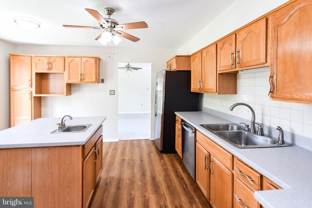 1222 Kings Tree Dr, Bowie, MD 20721 - kitchen with a sink, stainless steel appliances, ceiling fan, and decorative backsplash