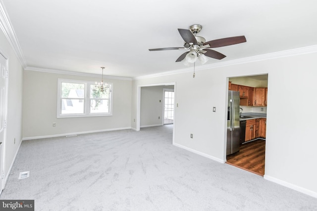1222 Kings Tree Dr, Bowie, MD 20721 - unfurnished living room with carpet, crown molding, a sink, a chandelier, and a ceiling fan
