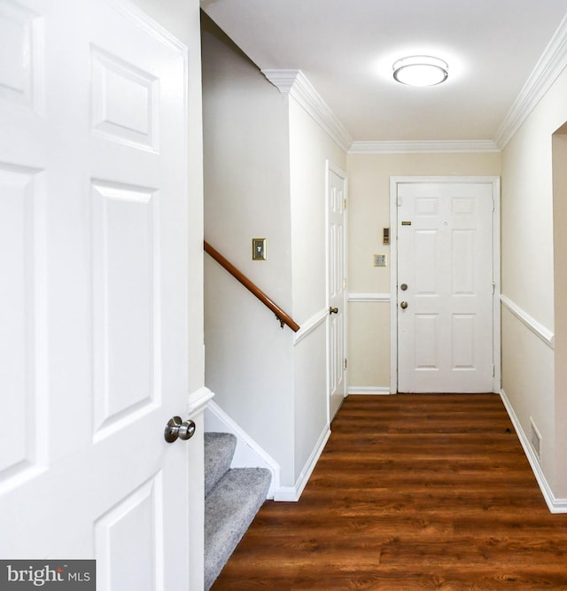1222 Kings Tree Dr, Bowie, MD 20721 - foyer featuring dark wood-style floors, crown molding, and baseboards