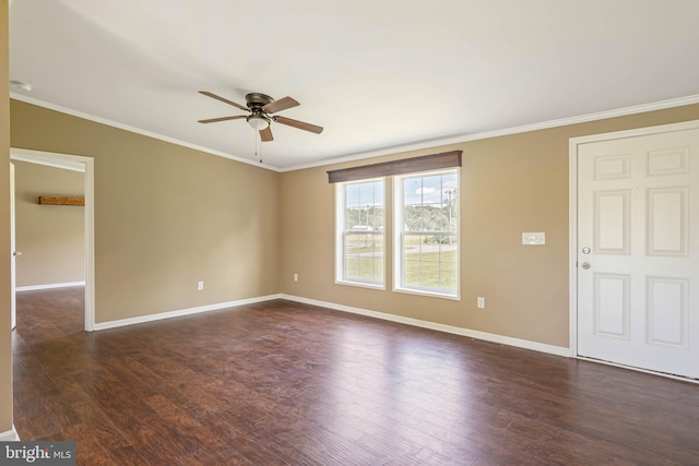35 Dapple Gray Ln, Dover, DE 19904 - empty room featuring ceiling fan, baseboards, dark wood-style flooring, and crown molding