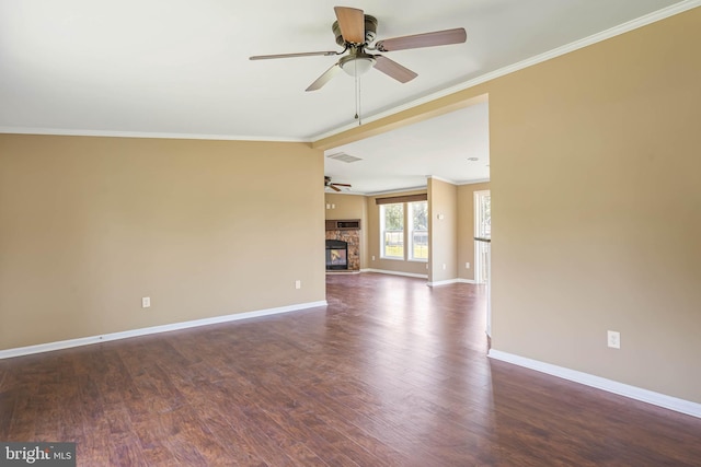 35 Dapple Gray Ln, Dover, DE 19904 - unfurnished living room featuring ceiling fan, baseboards, crown molding, wood finished floors, and a fireplace