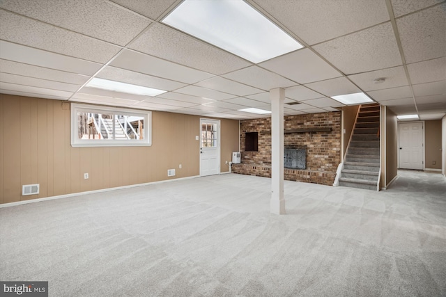 13925 Wayside Dr, Clarksville, MD 21029 - below grade area featuring a drop ceiling, stairs, carpet, baseboards, and a brick fireplace