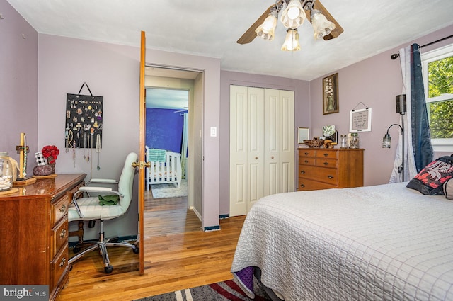 612 Colonial Dr, Dallastown, PA 17313 - bedroom featuring light wood-style floors, a closet, baseboards, ceiling fan, and a desk