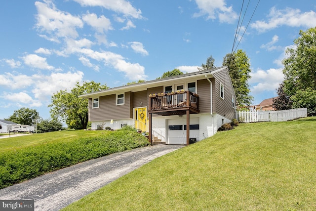 612 Colonial Dr, Dallastown, PA 17313 - split foyer home with driveway, an attached garage, and brick siding
