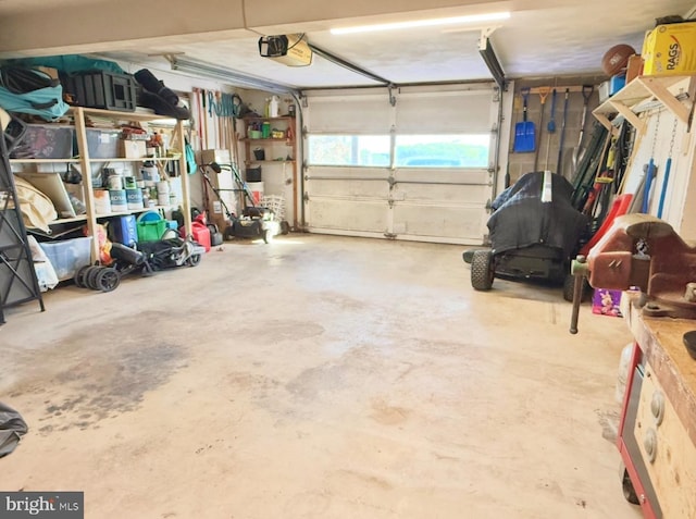 612 Colonial Dr, Dallastown, PA 17313 - garage featuring a garage door opener