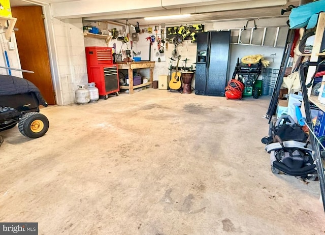 612 Colonial Dr, Dallastown, PA 17313 - garage with black fridge