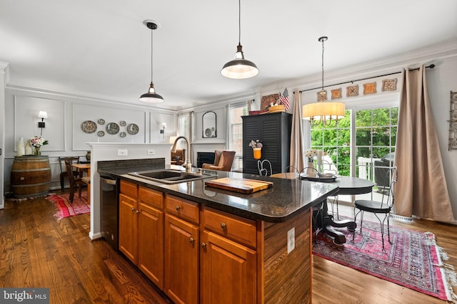 43614 Dunhill Cup Sq, Ashburn, VA 20147 - kitchen featuring a sink, ornamental molding, brown cabinetry, dishwashing machine, and dark wood-style flooring