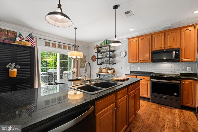 43614 Dunhill Cup Sq, Ashburn, VA 20147 - kitchen featuring appliances with stainless steel finishes, a sink, crown molding, hanging light fixtures, and backsplash