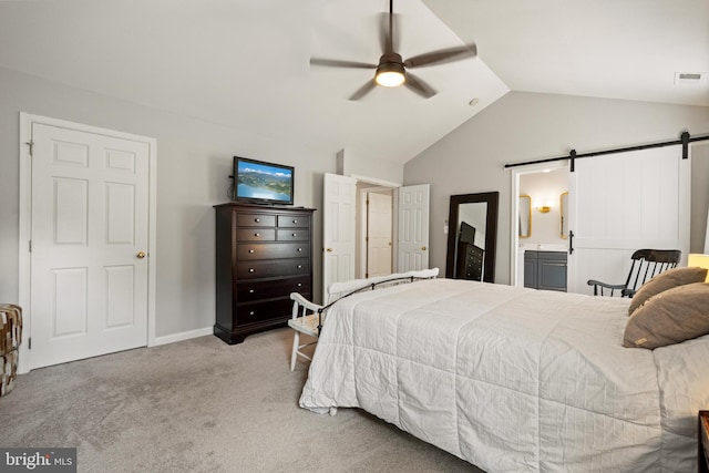 43614 Dunhill Cup Sq, Ashburn, VA 20147 - bedroom featuring vaulted ceiling, a barn door, carpet flooring, ceiling fan, and baseboards