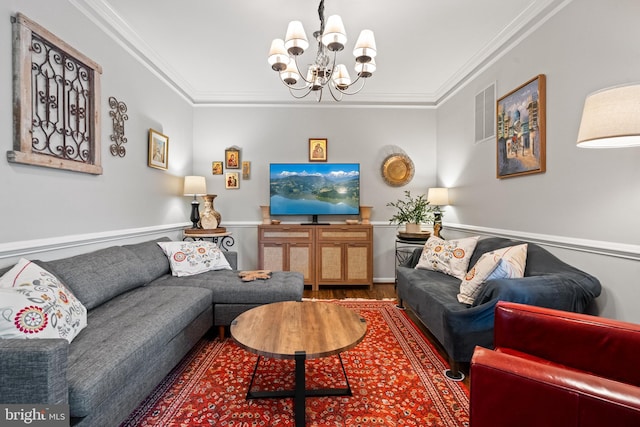43614 Dunhill Cup Sq, Ashburn, VA 20147 - living room featuring a chandelier, wood finished floors, and crown molding