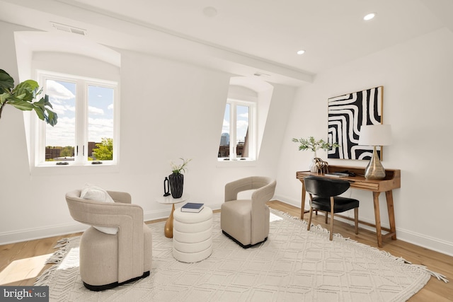1202 Eton Ct NW Unit T3, Washington, DC 20007 - living area featuring healthy amount of natural light, wood finished floors, recessed lighting, and baseboards