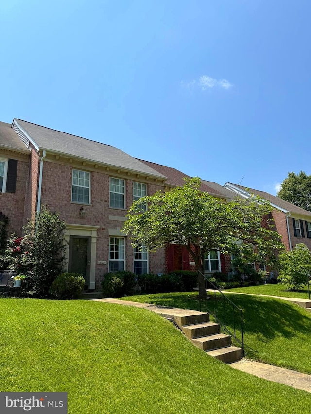 3942 Forest Valley Rd, Baltimore, MD 21234 - view of front of home featuring a front yard and brick siding