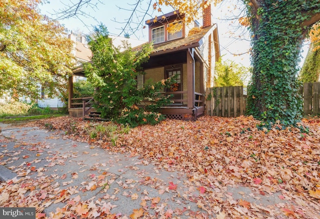 28 Chestnut St, Salem, NJ 08079 - view of property exterior featuring a chimney